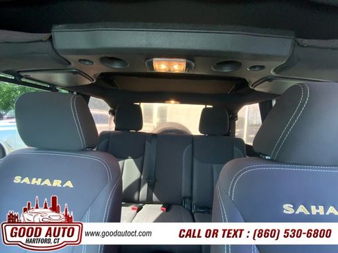 Used 2015 Jeep Wrangler Unlimited Sahara w/ Dual Top Group AWD/4WD image 16