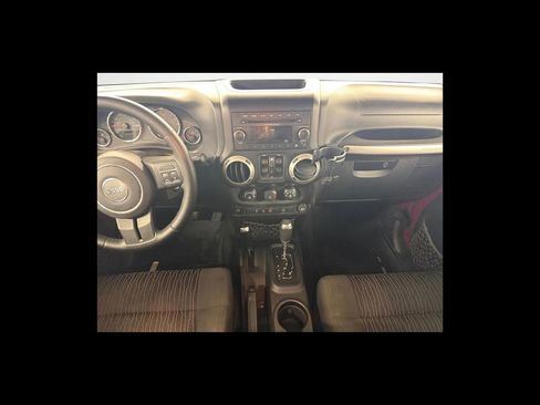 Used 2012 Jeep Wrangler Unlimited Sahara w/ Dual Top Group AWD/4WD image 13