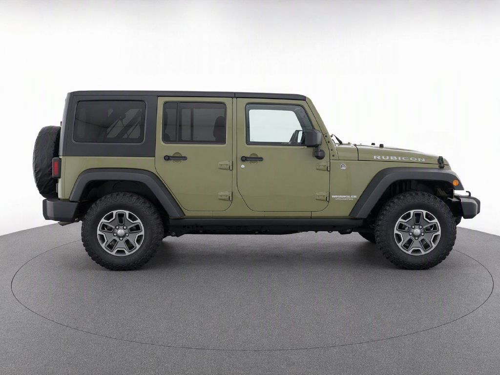 Used 2013 Jeep Wrangler Unlimited Rubicon w/ Dual Top Group AWD/4WD image 10