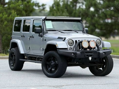 Used 2014 Jeep Wrangler Unlimited Rubicon w/ Dual Top Group AWD/4WD image 13