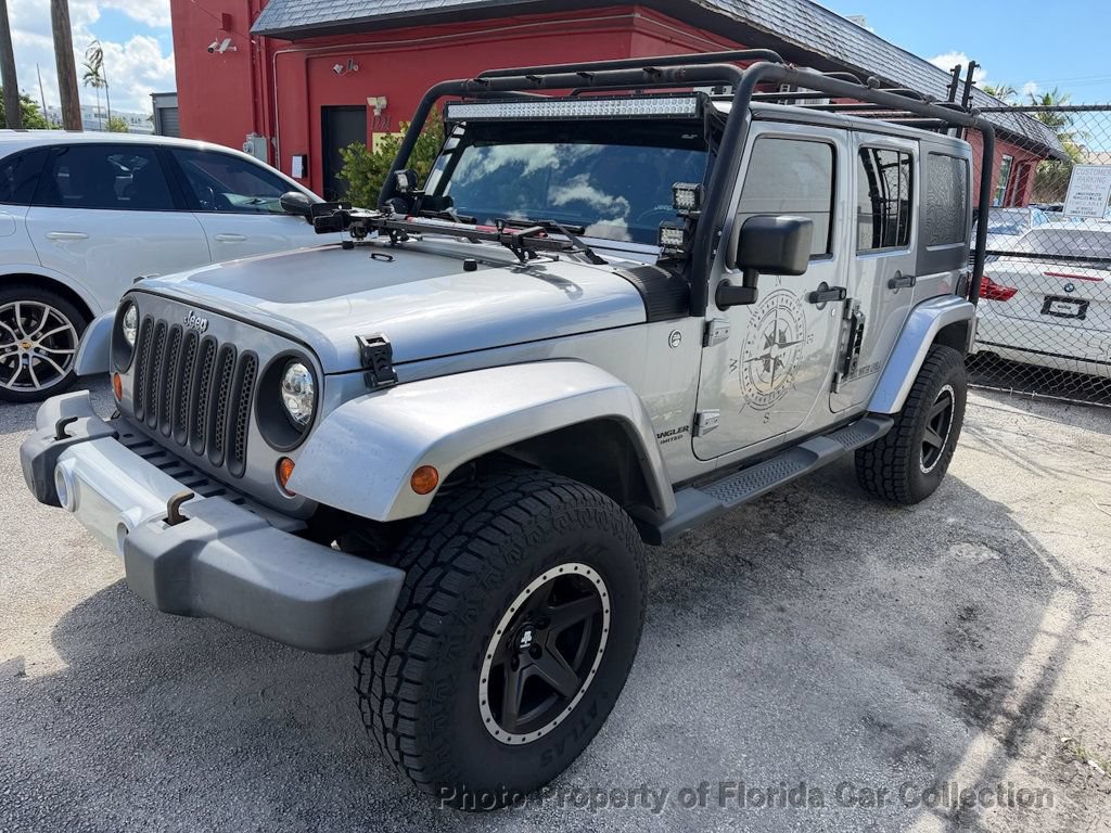 Used 2013 Jeep Wrangler Unlimited Sahara w/ Connectivity Group AWD/4WD image 1