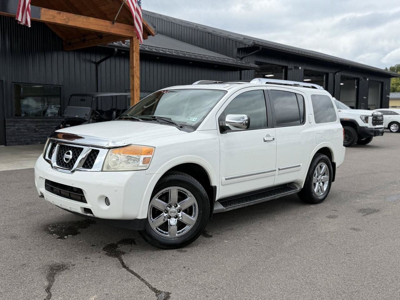 Used 2011 Nissan Armada Platinum w/ 2nd Row Captain Seat Pkg AWD/4WD image 1