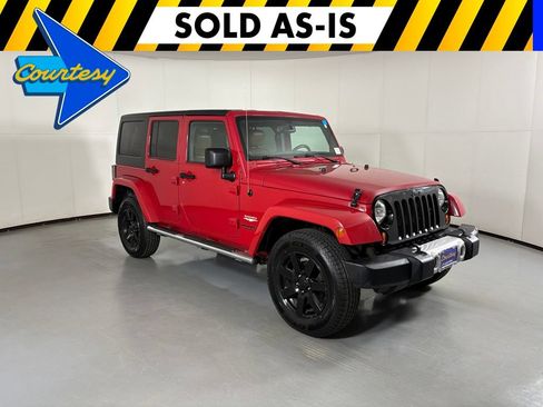 Used 2013 Jeep Wrangler Unlimited Sahara w/ Mopar Chrome Edition Group AWD/4WD image 1