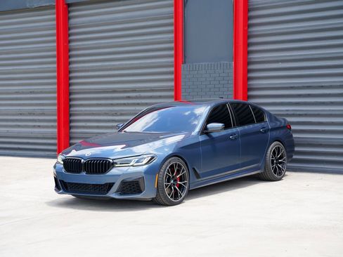 Used 2023 BMW M550i xDrive w/ Executive Package AWD/4WD image 1