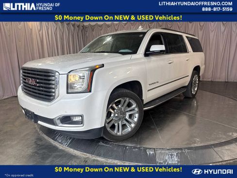 Used 2019 GMC Yukon XL SLT w/ Premium Edition AWD/4WD image 1