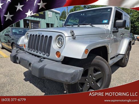 Used 2012 Jeep Wrangler Sahara AWD/4WD image 1