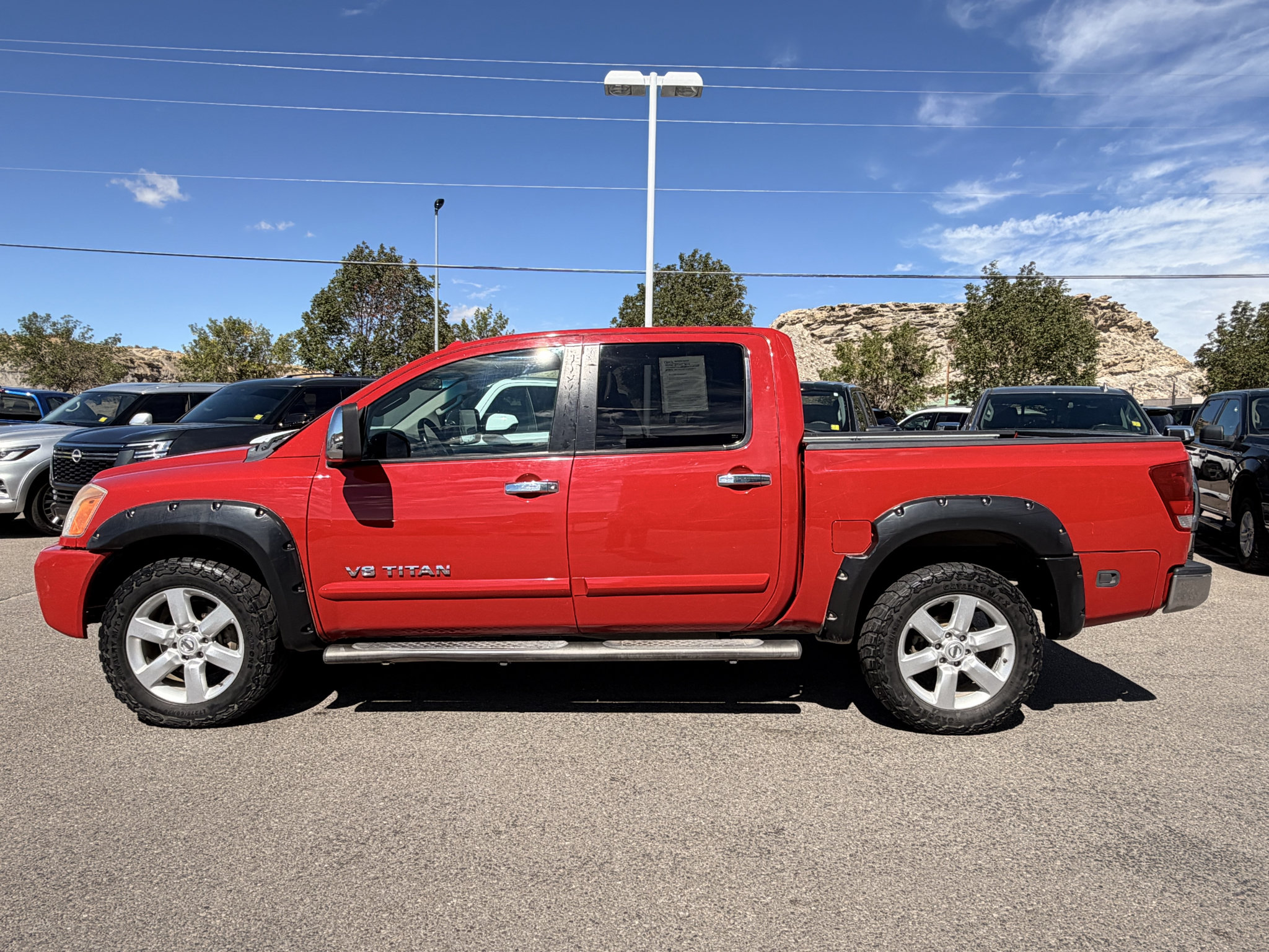 Used 2012 Nissan Titan SL w/ SL Max Utility Pkg AWD/4WD image 2