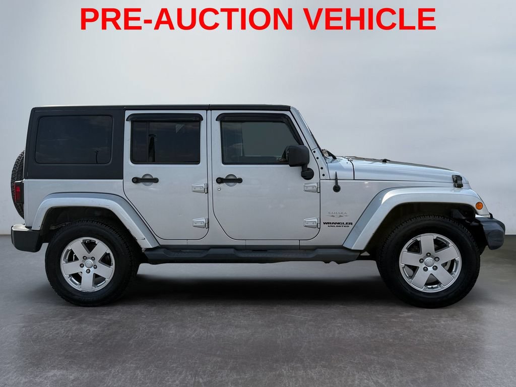 Used 2011 Jeep Wrangler Unlimited Sahara w/ Connectivity Group AWD/4WD image 2