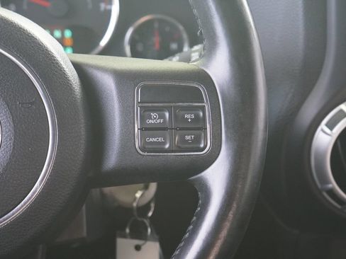 Used 2012 Jeep Wrangler Unlimited Sahara w/ Dual Top Group AWD/4WD image 16
