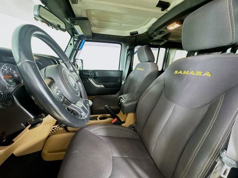 Used 2013 Jeep Wrangler Unlimited Sahara w/ Dual Top Group AWD/4WD image 12
