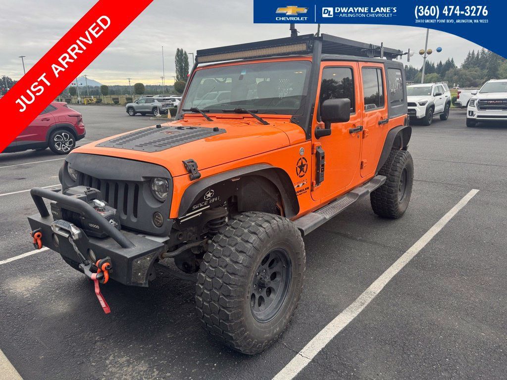 Used 2012 Jeep Wrangler Unlimited Sahara w/ Connectivity Group AWD/4WD image 1