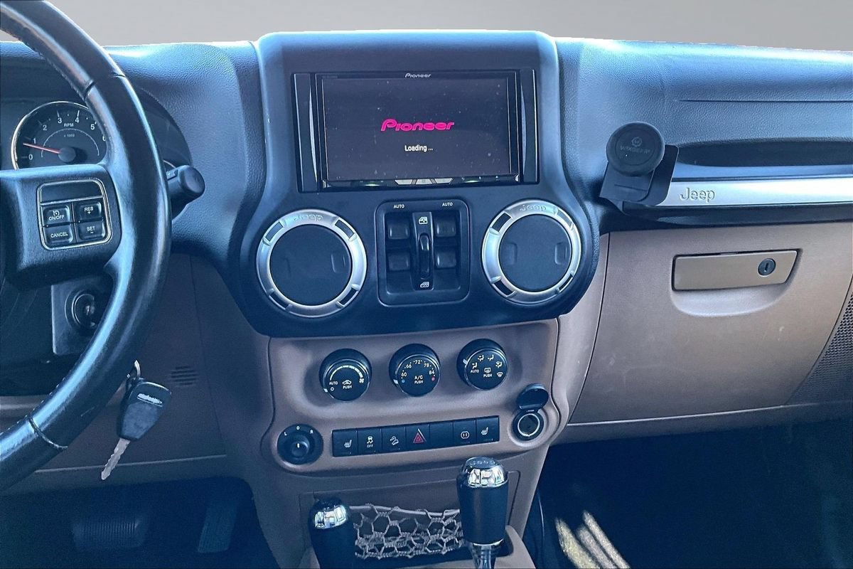 Used 2012 Jeep Wrangler Unlimited Sahara w/ Dual Top Group AWD/4WD image 25