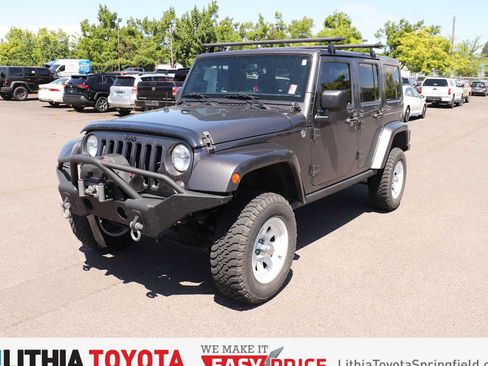 Used 2016 Jeep Wrangler Unlimited Sahara AWD/4WD image 1