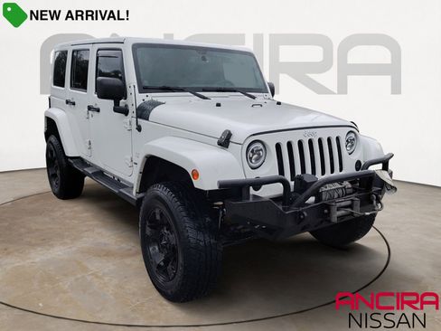 Used 2014 Jeep Wrangler Unlimited Sahara w/ Max Tow Package AWD/4WD image 1