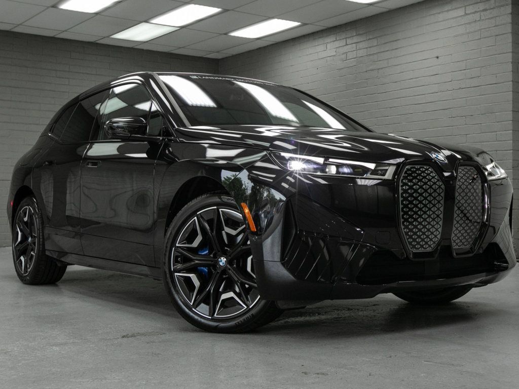 Used 2024 BMW iX xDrive50 w/ Premium Package AWD/4WD image 1