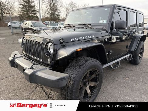 Used 2015 Jeep Wrangler Unlimited Rubicon w/ Dual Top Group image 1