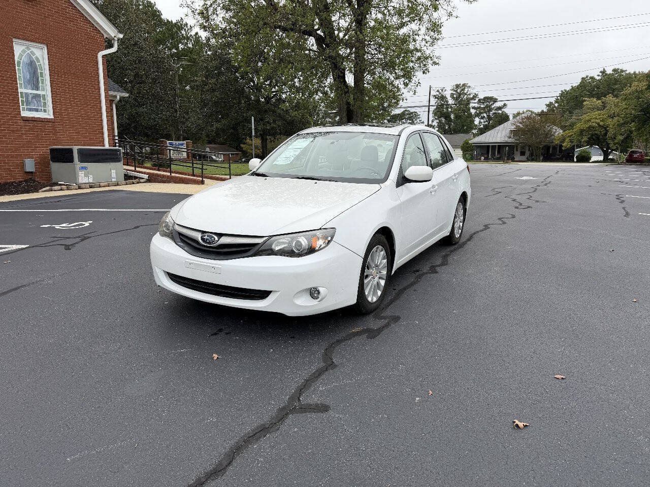 Used 2011 Subaru Impreza 2.5i Premium w/ PWR Moonroof Value Pkg AWD/4WD image 1