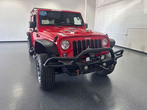 Used 2015 Jeep Wrangler Unlimited Sahara AWD/4WD image 1