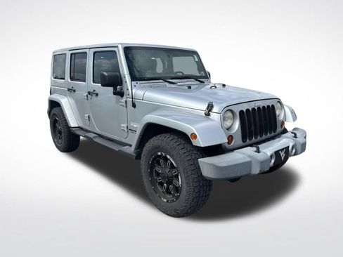 Used 2012 Jeep Wrangler Unlimited Sahara w/ Dual Top Group AWD/4WD image 2