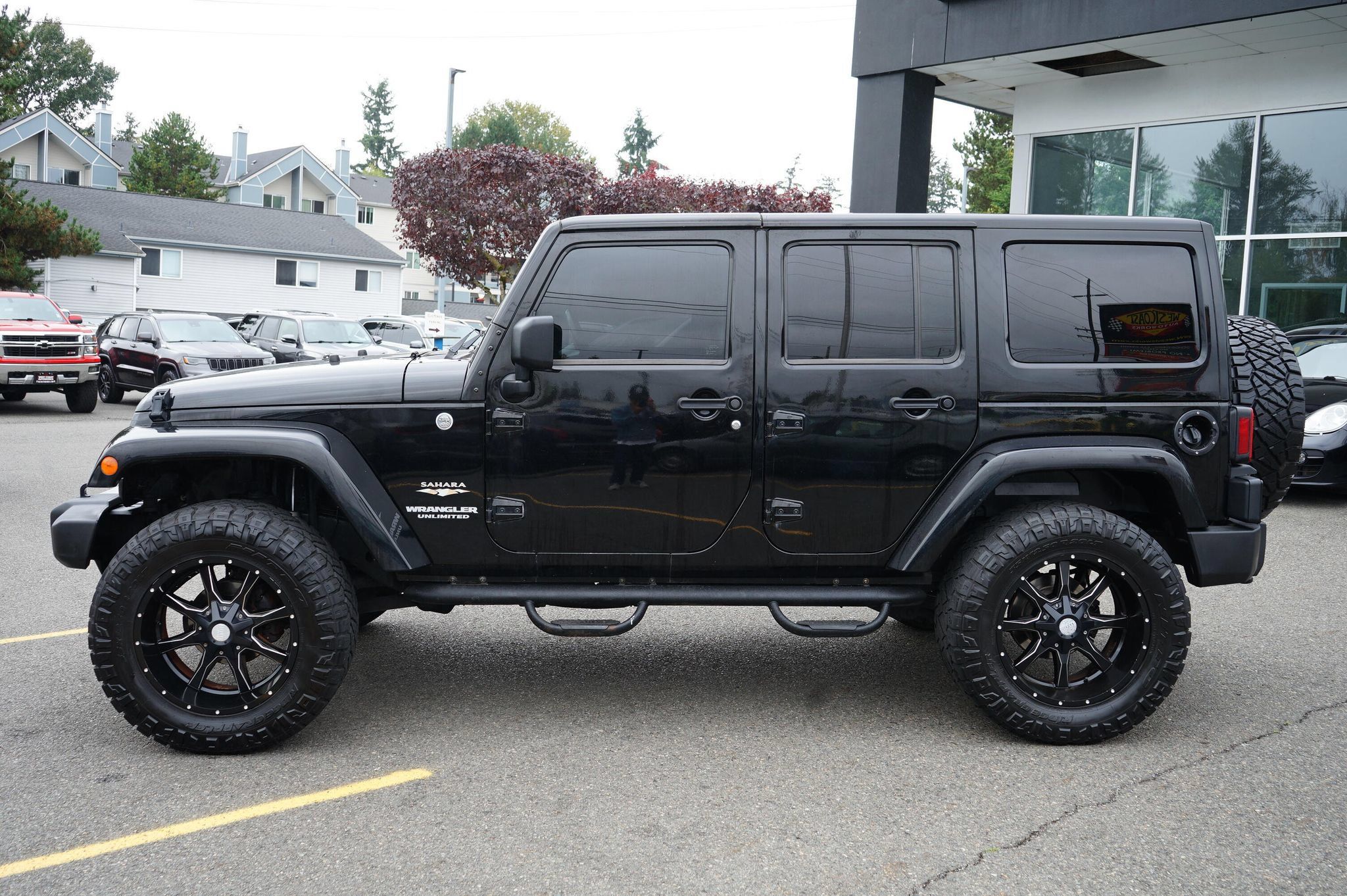 Used 2013 Jeep Wrangler Unlimited Sahara w/ Dual Top Group AWD/4WD image 2