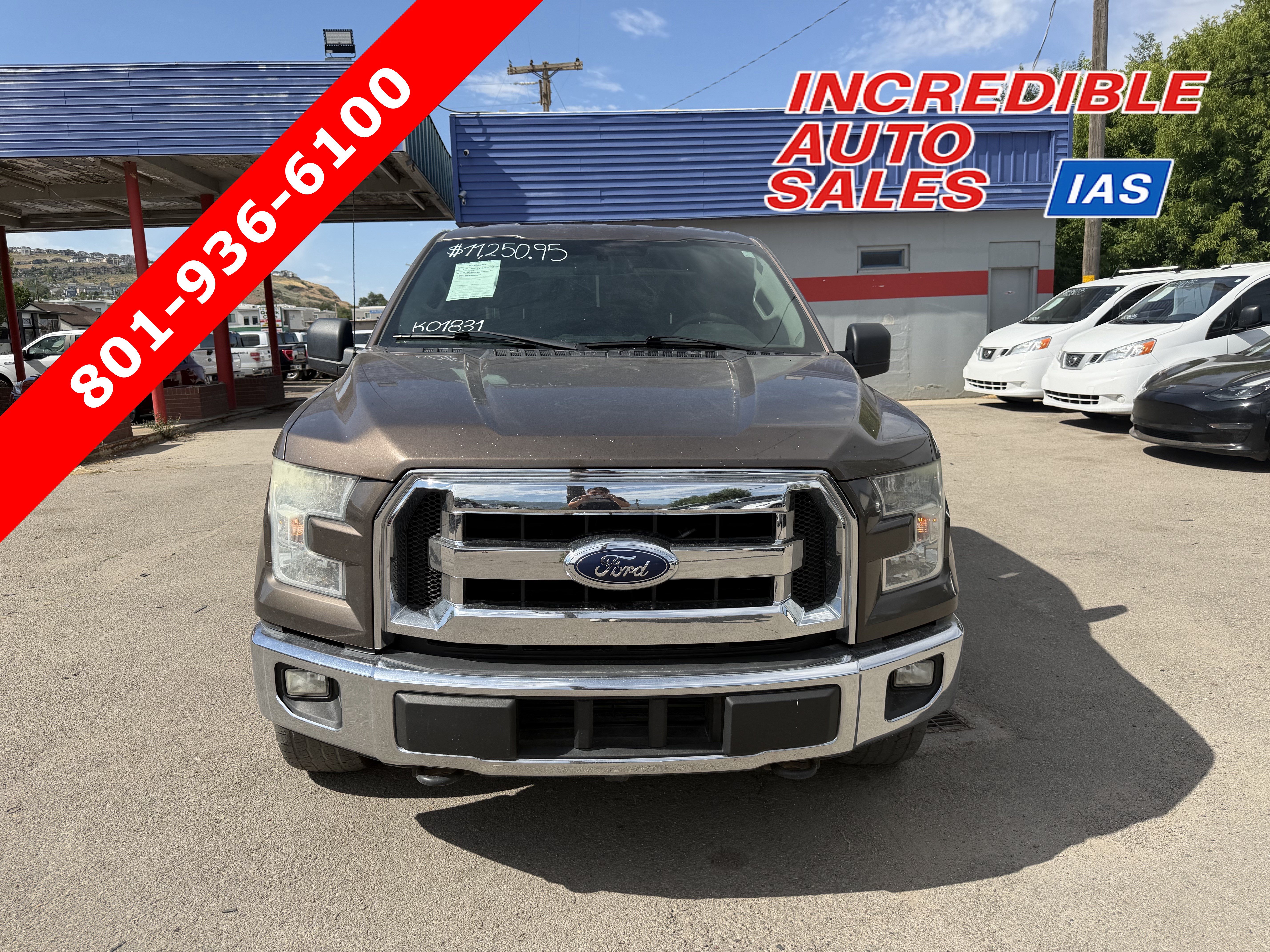 Used 2015 Ford F150 XLT AWD/4WD image 1