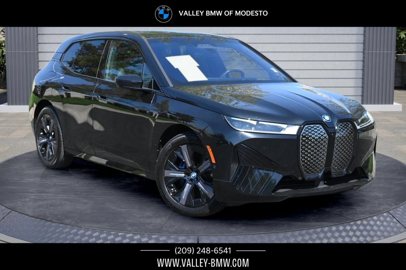 Certified 2024 BMW iX xDrive50 w/ Premium Package AWD/4WD image 1