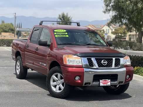 Used 2013 Nissan Titan SV w/ SV Value Truck Pkg AWD/4WD image 1