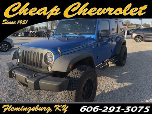 Used 2016 Jeep Wrangler Unlimited Sport image 1