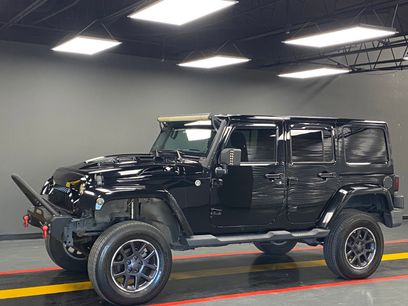 Used 2011 Jeep Wrangler Unlimited Sahara w/ Dual Top Group