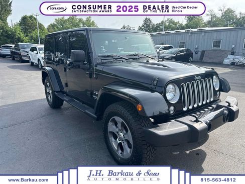 Used 2016 Jeep Wrangler Unlimited Sahara w/ Max Tow Package AWD/4WD image 1