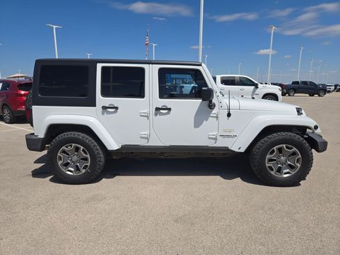 Used 2013 Jeep Wrangler Unlimited Sahara w/ Trailer Tow Group AWD/4WD image 2