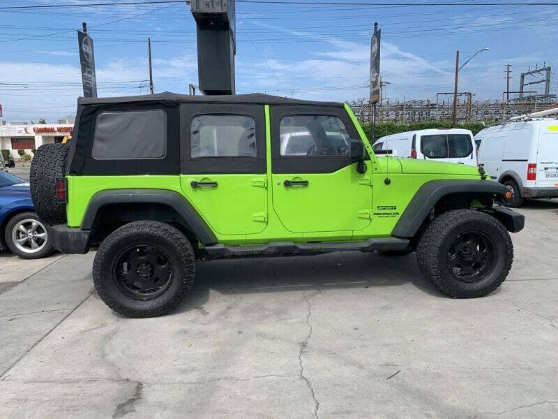 Used 2013 Jeep Wrangler Unlimited Sport w/ Mopar Black Appearance Group AWD/4WD image 7