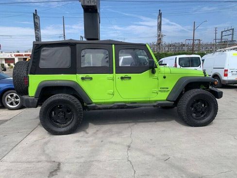Used 2013 Jeep Wrangler Unlimited Sport w/ Mopar Black Appearance Group AWD/4WD image 7