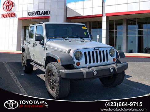 Used 2012 Jeep Wrangler Unlimited Sport w/ Connectivity Group AWD/4WD image 1