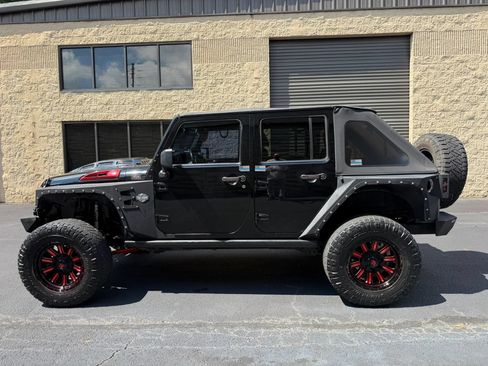 Used 2013 Jeep Wrangler Unlimited Sahara w/ Mopar Chrome Edition Group AWD/4WD image 3
