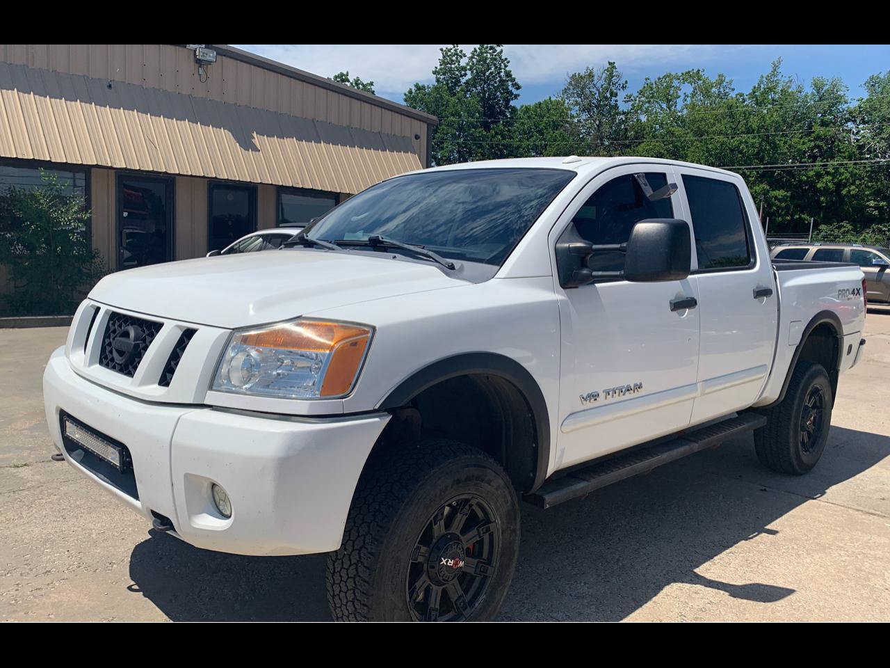 Used 2011 Nissan Titan PRO-4X w/ Pro-4x Premium Utility Pkg AWD/4WD image 1