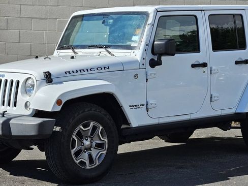 Used 2015 Jeep Wrangler Unlimited Rubicon w/ Connectivity Group AWD/4WD image 1