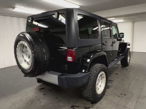 Used 2014 Jeep Wrangler Unlimited Sahara w/ Dual Top Group image 8