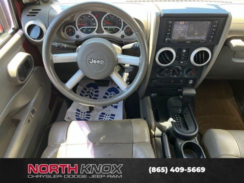 Used 2010 Jeep Wrangler Unlimited Sahara w/ Dual Top Group AWD/4WD image 11