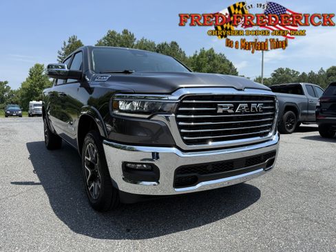 New 2026 RAM 1500 Laramie w/ Bed Utility Group AWD/4WD image 1