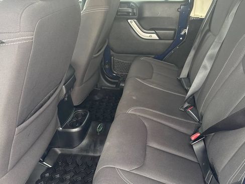 Used 2013 Jeep Wrangler Unlimited Rubicon w/ Dual Top Group AWD/4WD image 10
