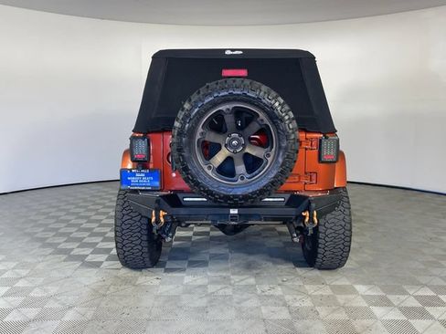 Used 2014 Jeep Wrangler Unlimited Sahara w/ Dual Top Group AWD/4WD image 23