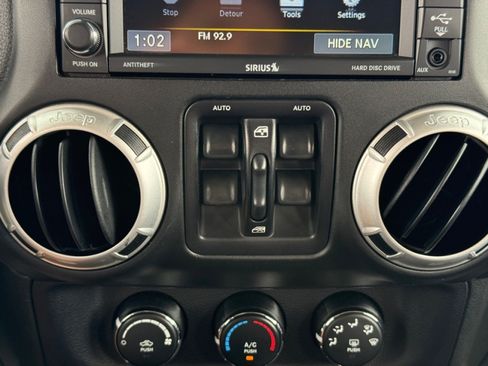 Used 2015 Jeep Wrangler Unlimited Sahara w/ Dual Top Group AWD/4WD image 16