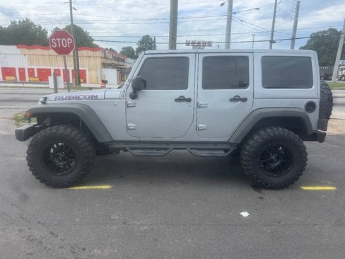 Used 2014 Jeep Wrangler Unlimited Rubicon w/ Dual Top Group AWD/4WD image 3