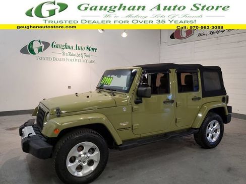 Used 2013 Jeep Wrangler Unlimited Sahara w/ Connectivity Group AWD/4WD image 1