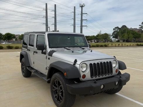 Used 2012 Jeep Wrangler Unlimited Sport AWD/4WD image 1