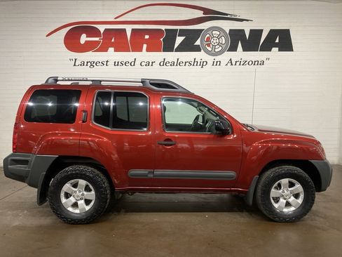 Used 2013 Nissan Xterra S image 1