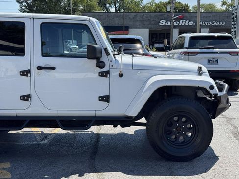 Used 2012 Jeep Wrangler Unlimited Sahara w/ Dual Top Group AWD/4WD image 14