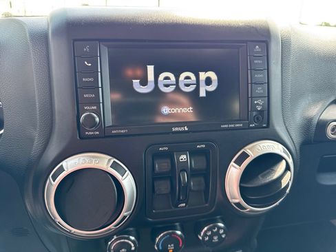 Used 2016 Jeep Wrangler Unlimited Sahara w/ Dual Top Group AWD/4WD image 13