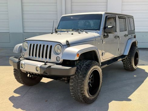 Used 2018 Jeep Wrangler Unlimited Sahara AWD/4WD image 1